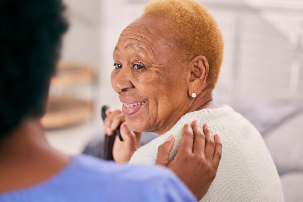 Caregiver helping elderly